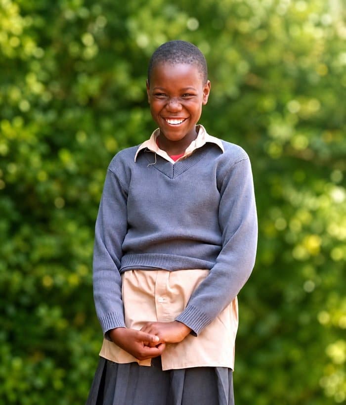 Joy, age 9, a child waiting for a sponsor at Bogetenga Children's Home in Kisii, Kenya
